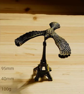 Self-Balancing Eagle with Eiffel Tower Toy