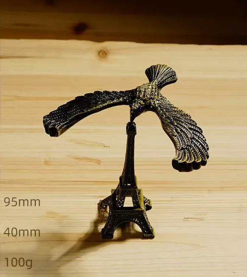 Self-Balancing Eagle with Eiffel Tower Toy